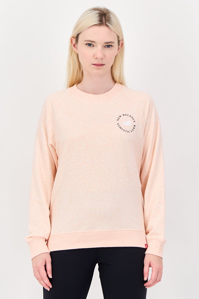 New Balance Women Relaxed Fit Long Sleeve Outdoor Sweatshirt, Pink - Image 1